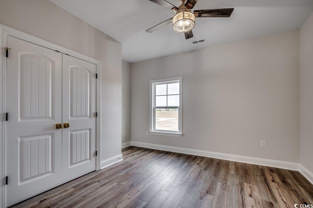 4975 Dupont Road Aynor, SC 29511 - Photo 16 of 22 Unfurnished bedroom with light hardwood / wood-sty