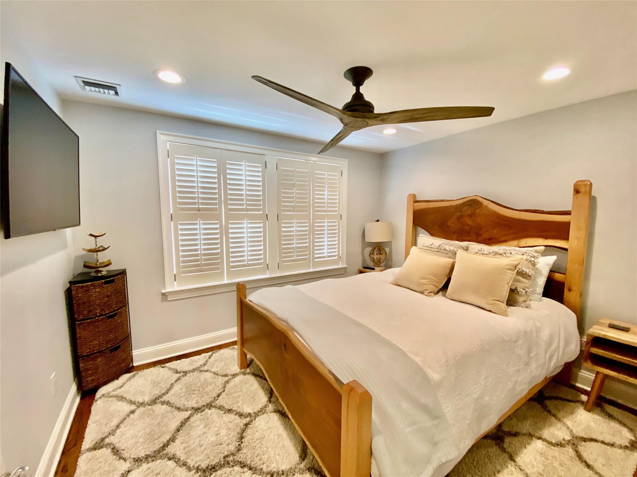 780 Minnehaha Boulevard Southold, NY 11971 - Photo 11 of 23 Bedroom featuring baseboards, visible vents, recessed lighting, and a ceiling fan