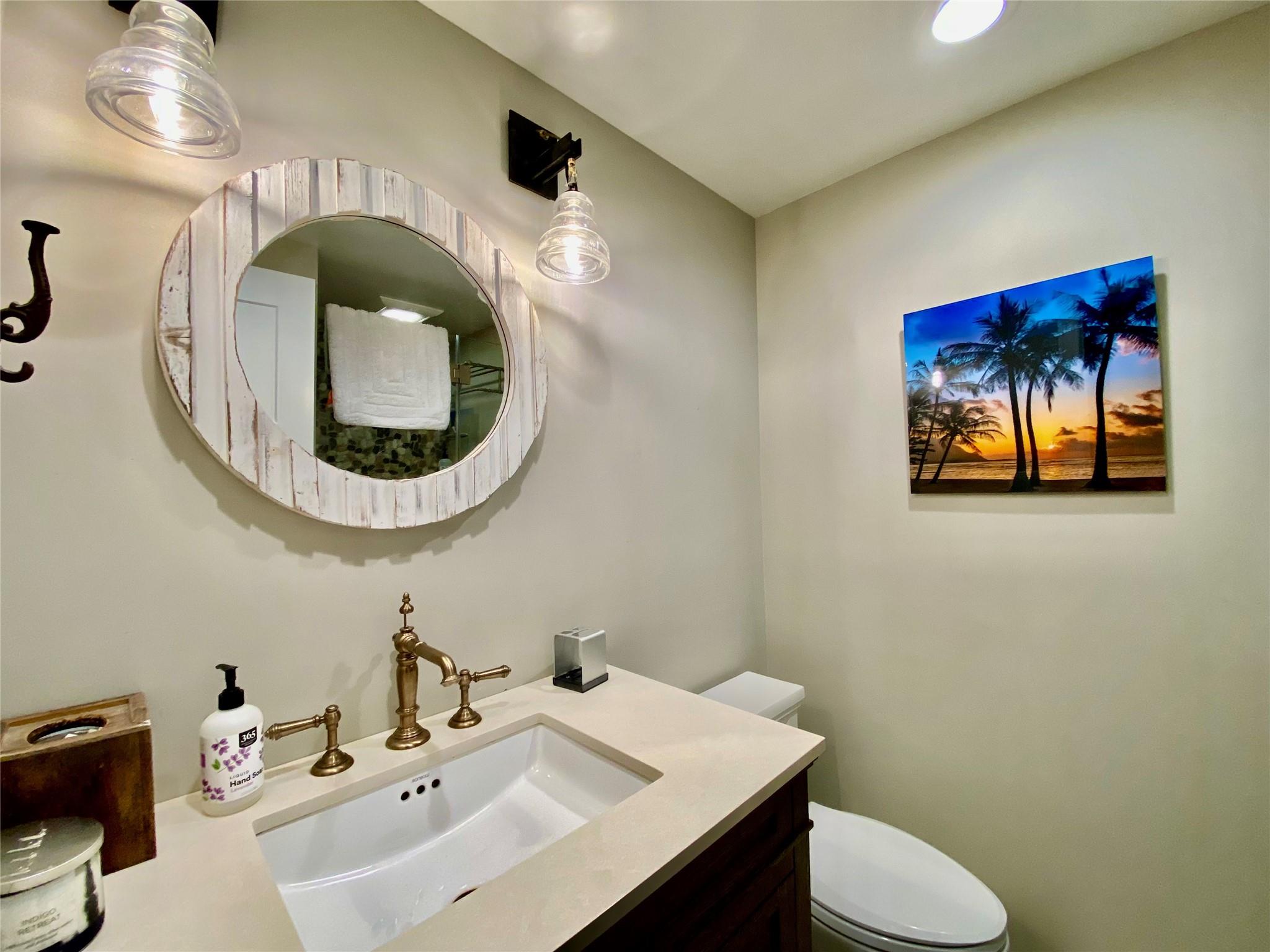 780 Minnehaha Boulevard Southold, NY 11971 - Photo 16 of 23 Bathroom with shower, toilet and vanity