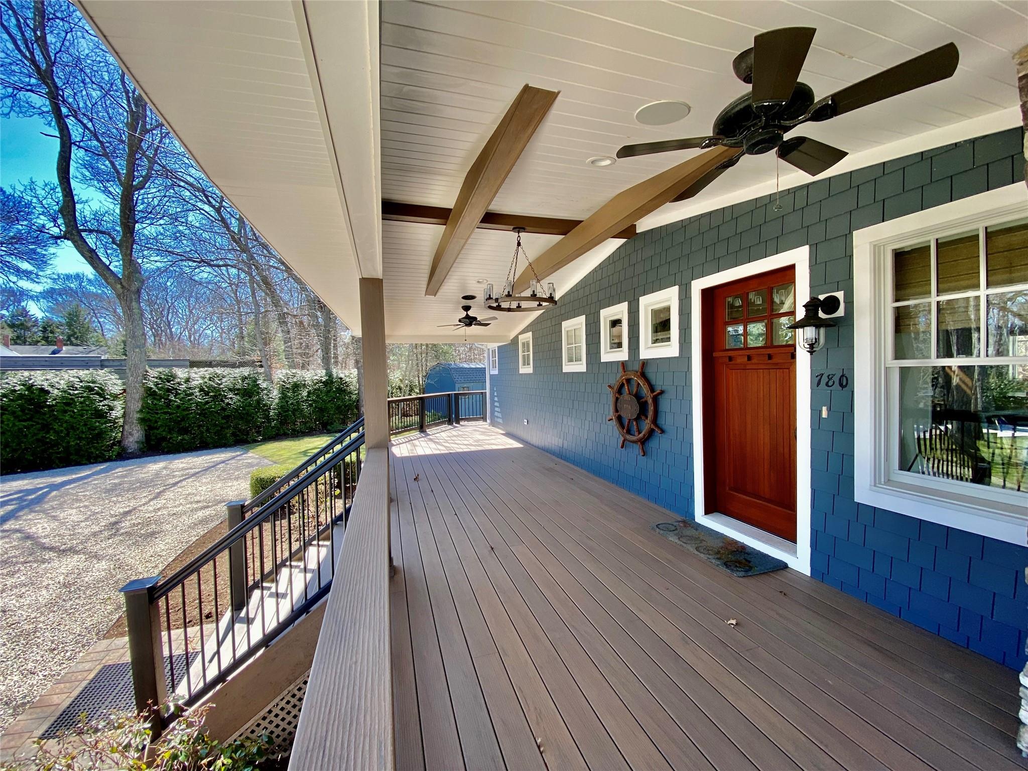 780 Minnehaha Boulevard Southold, NY 11971 - Photo 21 of 23 Front porch featuring ceiling fan