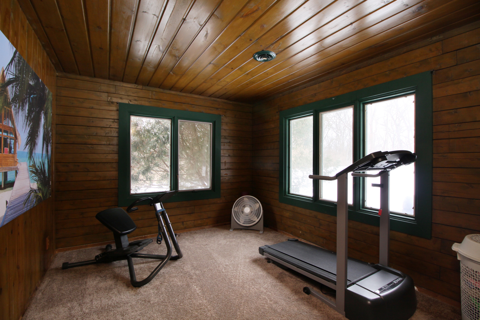 2002 Hawthorn Road Marengo, IL 60152 - Photo 17 of 27 a room with gym equipment and a large window