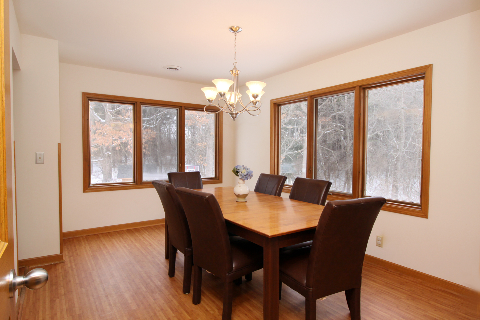 2002 Hawthorn Road Marengo, IL 60152 - Photo 4 of 27 a view of a dining room with furniture window and wooden floor