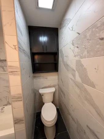 a bathroom with a sink a vanity and a mirror