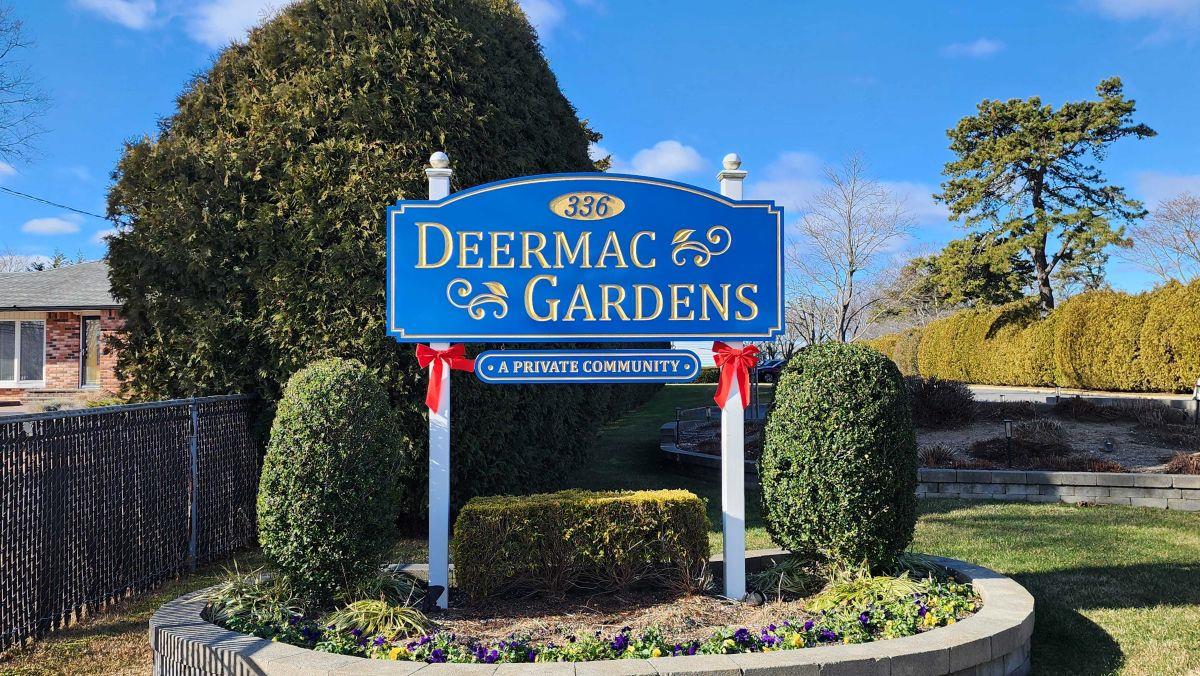 336 Commack Road, Unit 16 Deer Park, NY 11729 - Photo 1 of 1 a sign on the side of a building