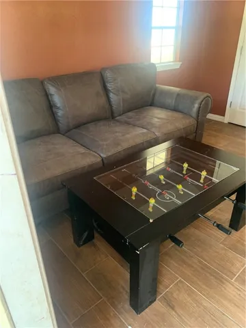 a living room with a couch and a table