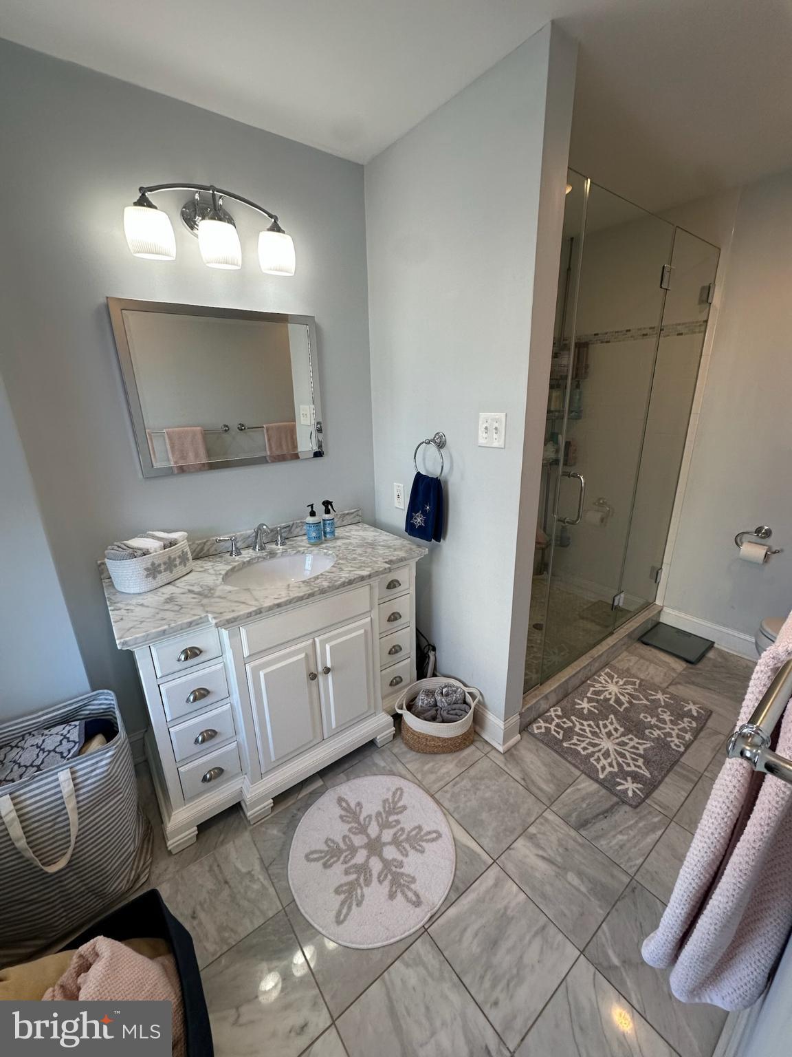 121 West Cottage Avenue Haddonfield, NJ 08033 - Photo 24 of 43 Modern primary bathroom with elegant finishes.