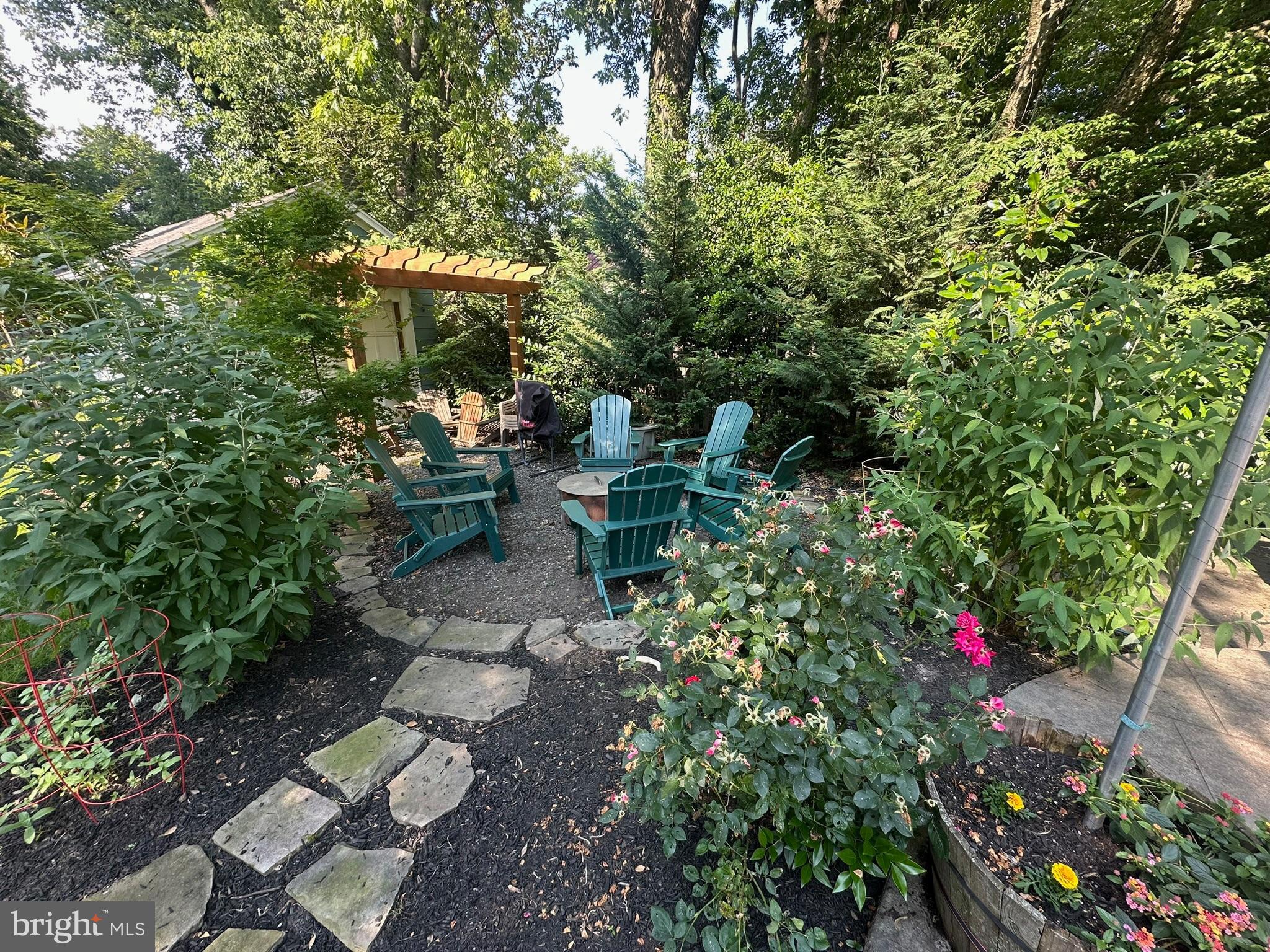 121 West Cottage Avenue Haddonfield, NJ 08033 - Photo 40 of 43 Serene garden retreat with cozy seating.