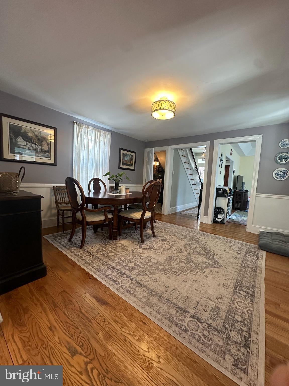 121 West Cottage Avenue Haddonfield, NJ 08033 - Photo 9 of 43 Elegant dining space with warm wooden tones.