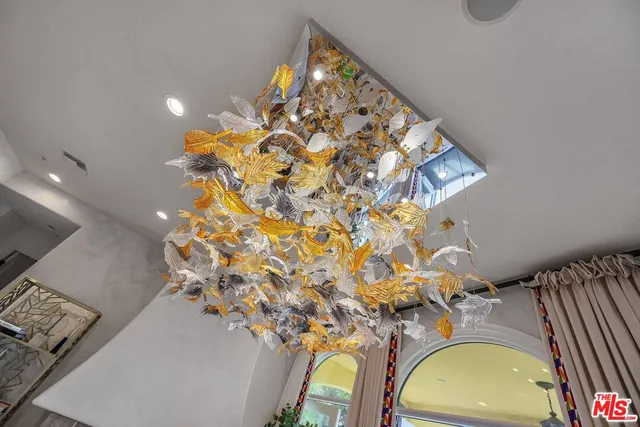 a view of a room with a large window