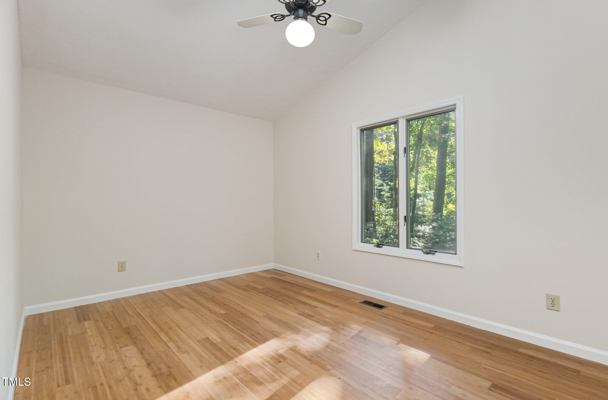 1423 Davis Road Hillsborough, NC 27278 - Photo 14 of 40 an empty room with a window