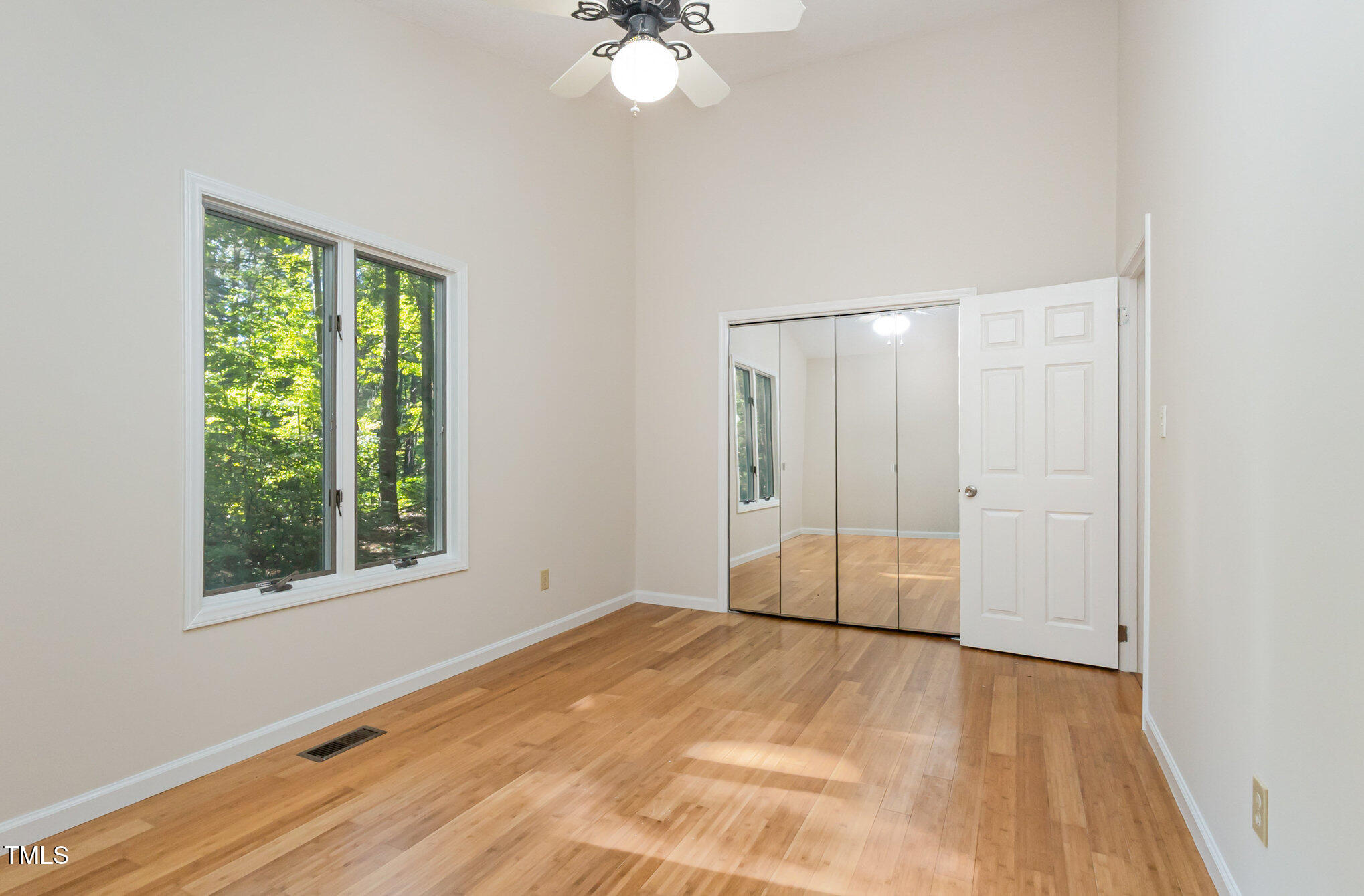 1423 Davis Road Hillsborough, NC 27278 - Photo 15 of 40 a view of an empty room with a window