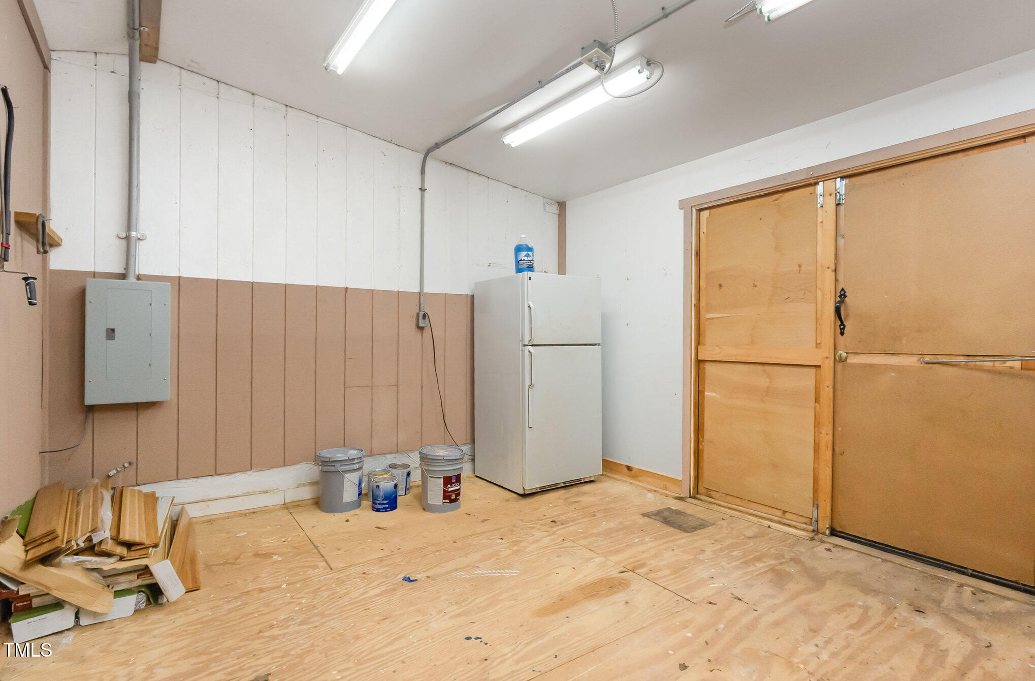 1423 Davis Road Hillsborough, NC 27278 - Photo 17 of 40 a view of a storage & utility room with a sink