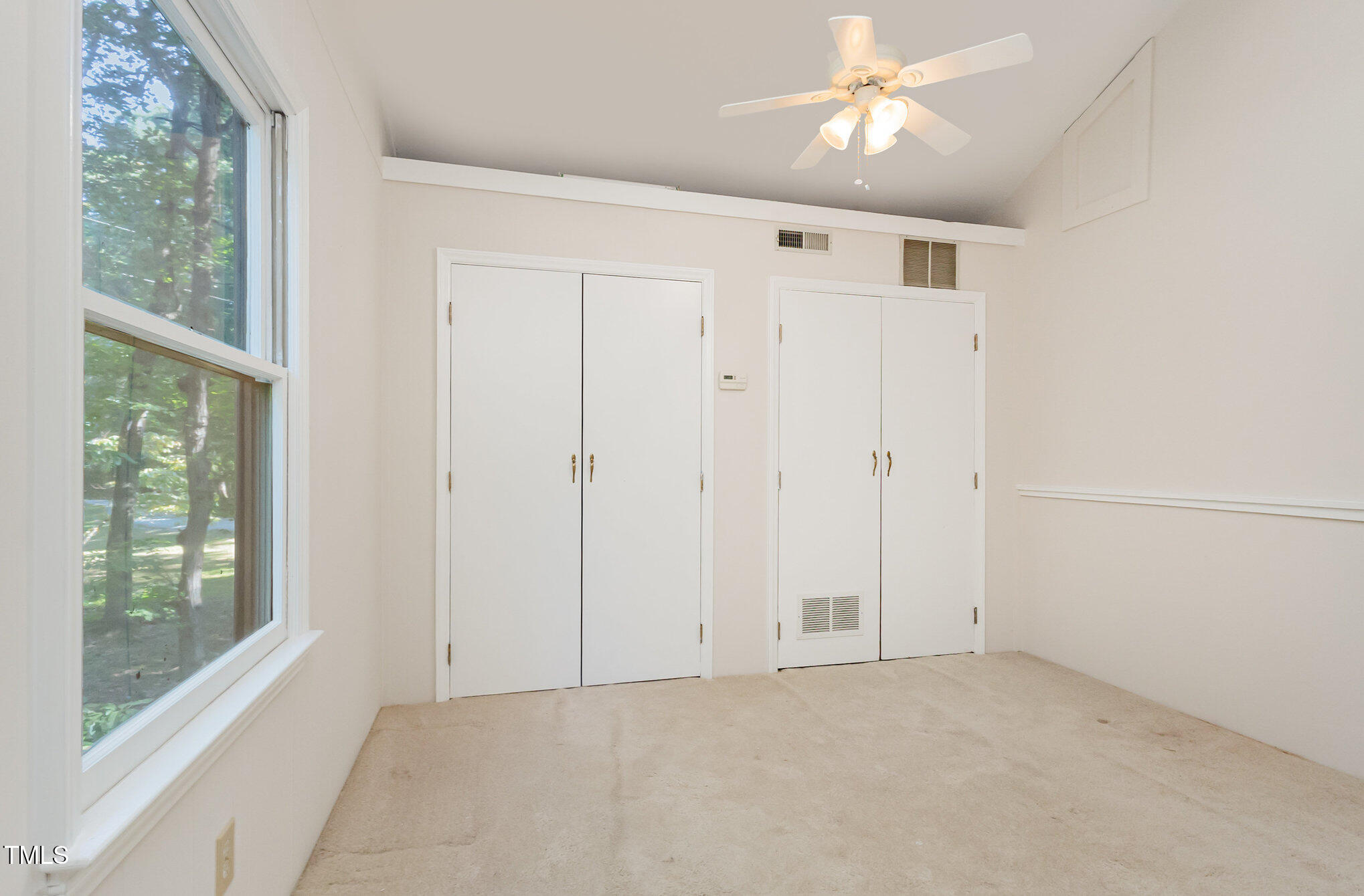 1423 Davis Road Hillsborough, NC 27278 - Photo 22 of 40 a view of an empty room with a window