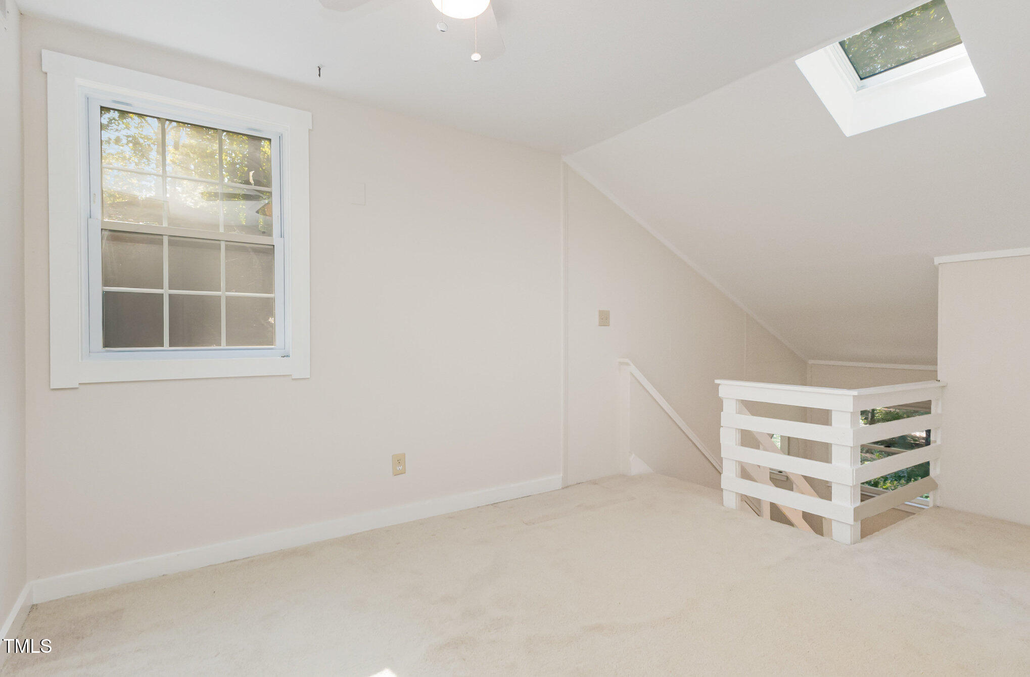 1423 Davis Road Hillsborough, NC 27278 - Photo 24 of 40 an empty room with a window and cabinet