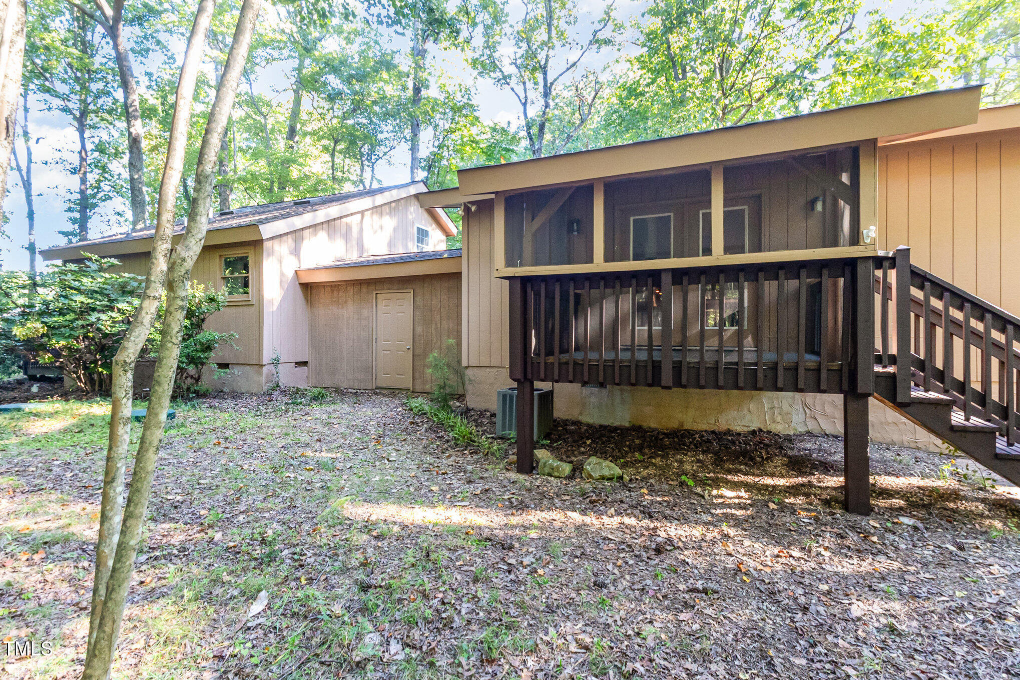 1423 Davis Road Hillsborough, NC 27278 - Photo 34 of 40 a view of a house with a yard and wooden fence