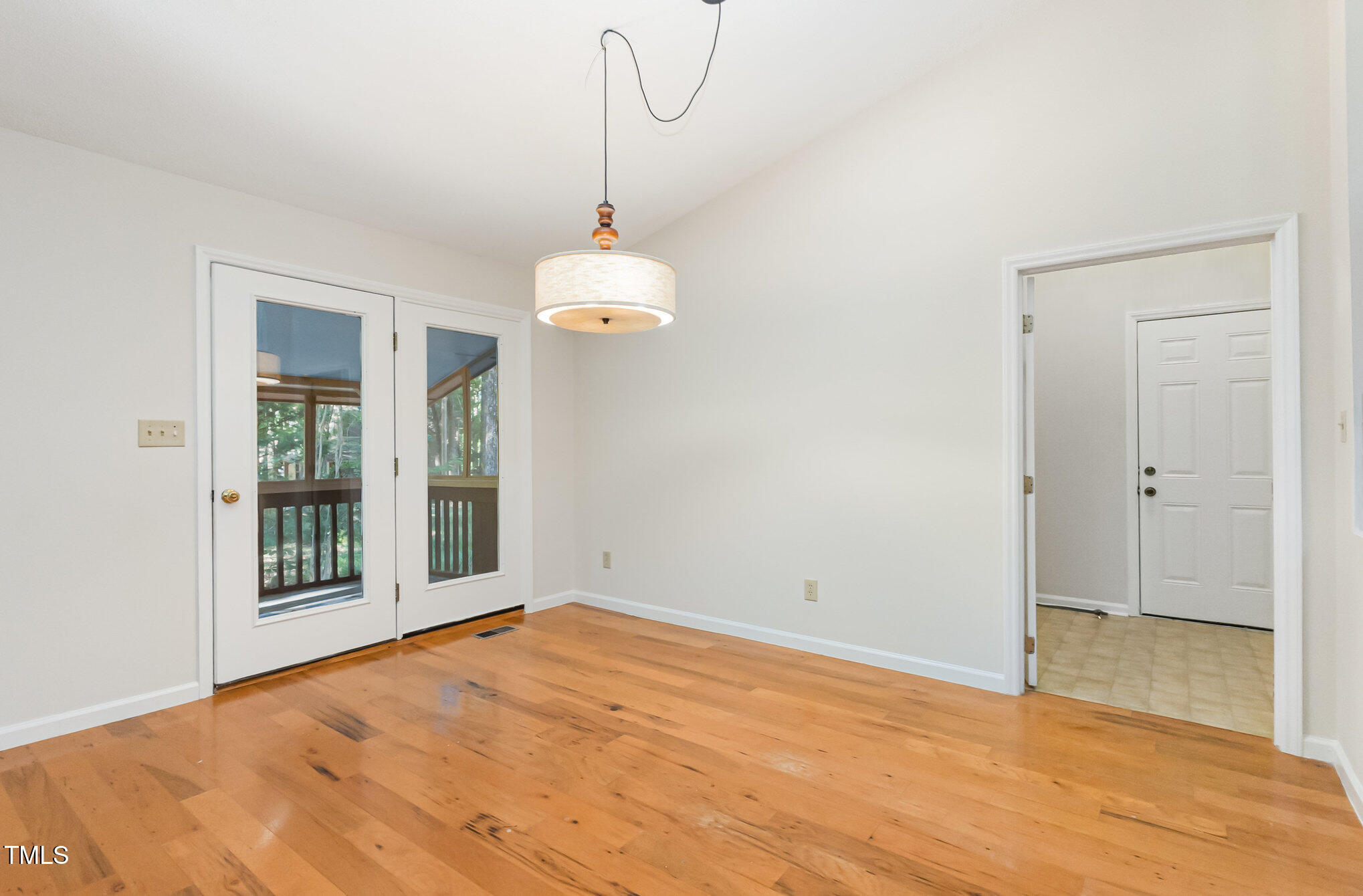 1423 Davis Road Hillsborough, NC 27278 - Photo 5 of 40 a view of empty room with wooden floor