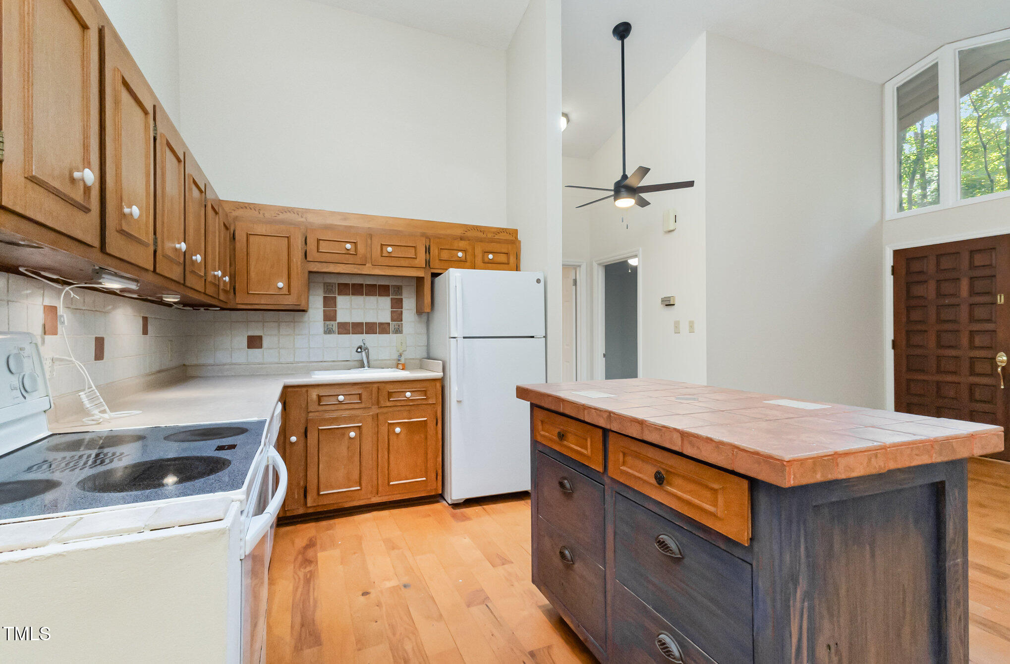 1423 Davis Road Hillsborough, NC 27278 - Photo 6 of 40 a kitchen with stainless steel appliances granite countertop a sink stove and refrigerator