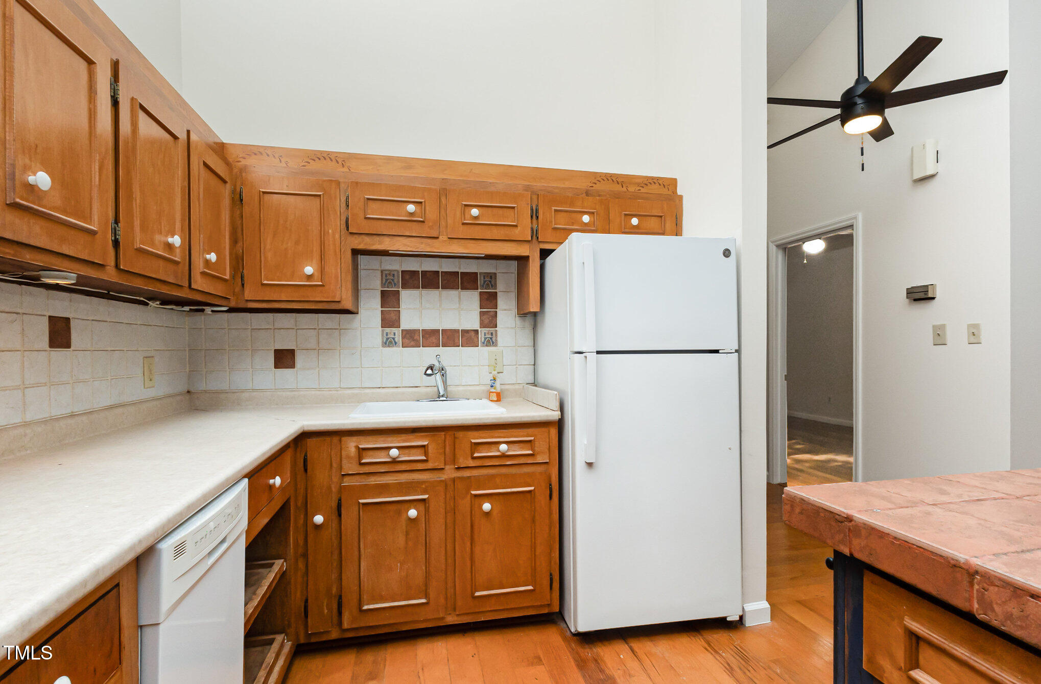 1423 Davis Road Hillsborough, NC 27278 - Photo 8 of 40 a kitchen with stainless steel appliances granite countertop a refrigerator a stove and a sink