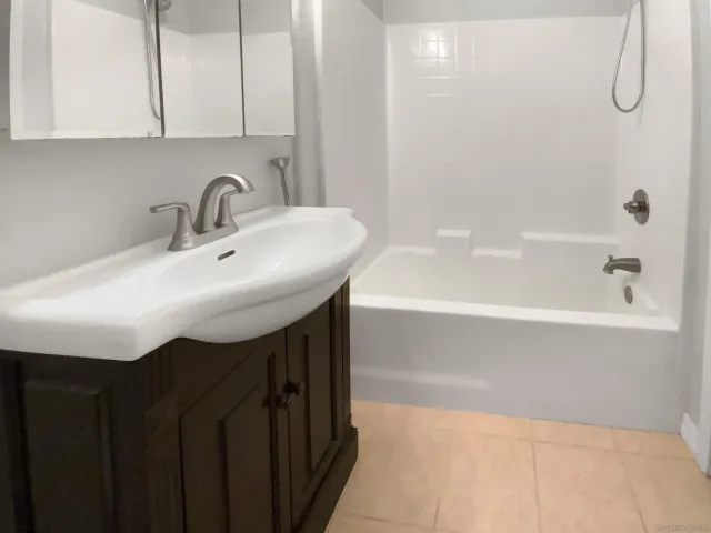 a bathroom with a sink and a bathtub