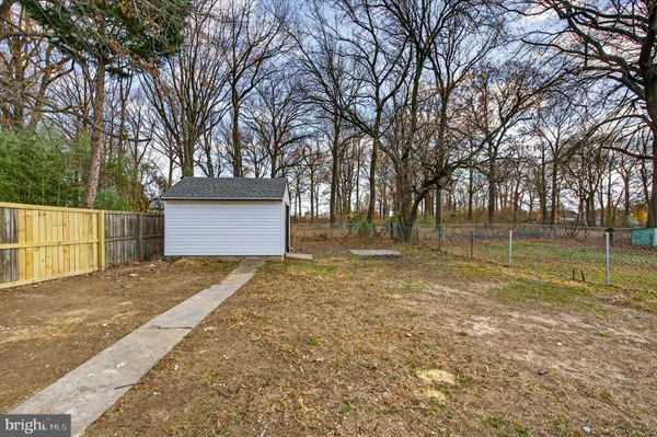 a view of backyard with green space