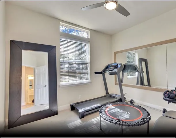 a room with furniture and a window