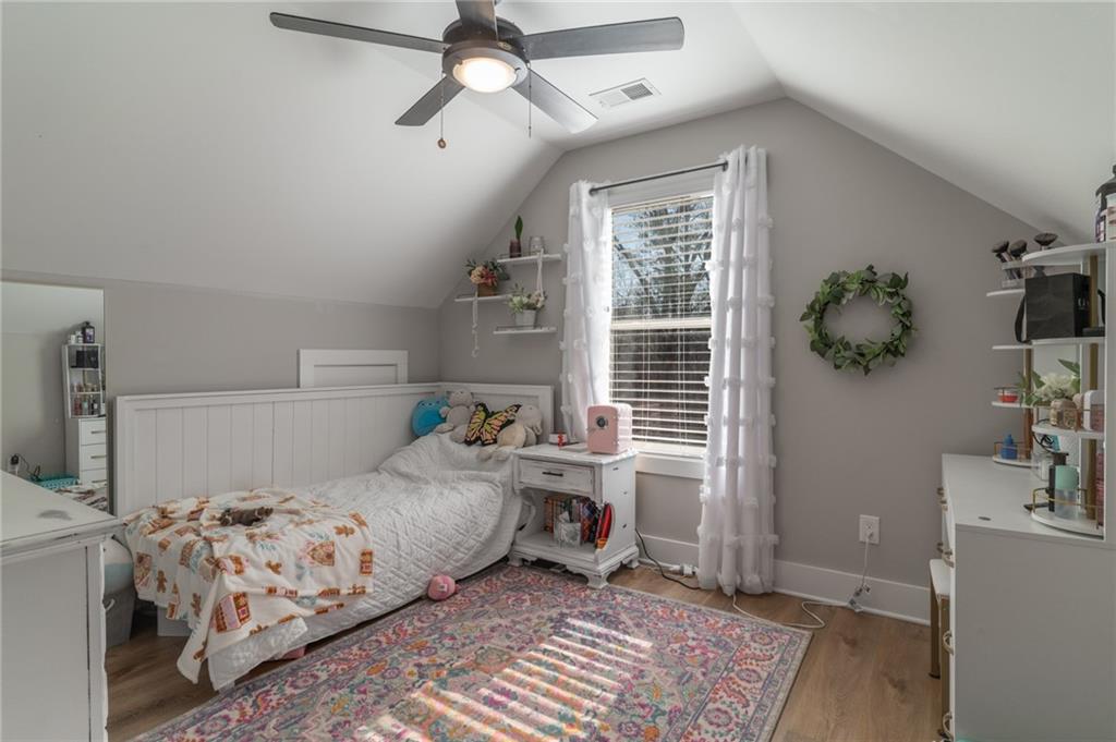 2250 Sperin Road Ball Ground, GA 30107 - Photo 43 of 56 a bedroom with a bed and a window
