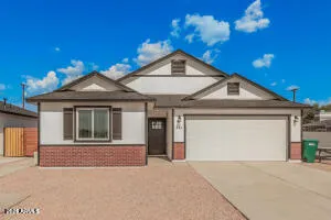 a view of a house with a garage