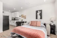 a kitchen with a table and chair in it