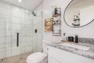 a kitchen with refrigerator a sink and cabinets