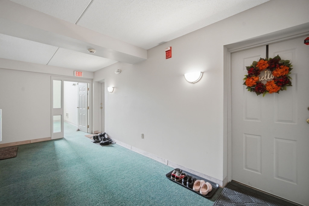 32 Maple Crest Circle, Unit G Holyoke, MA 01040 - Photo 30 of 34 a view of an empty room with a window