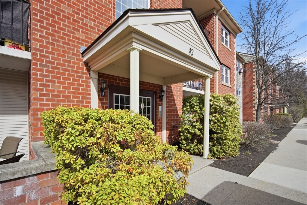 32 Maple Crest Circle, Unit G Holyoke, MA 01040 - Photo 34 of 34 a front view of a house with garden