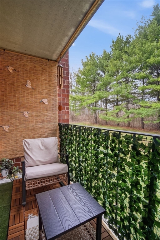 32 Maple Crest Circle, Unit G Holyoke, MA 01040 - Photo 9 of 34 a view of a yard with plants