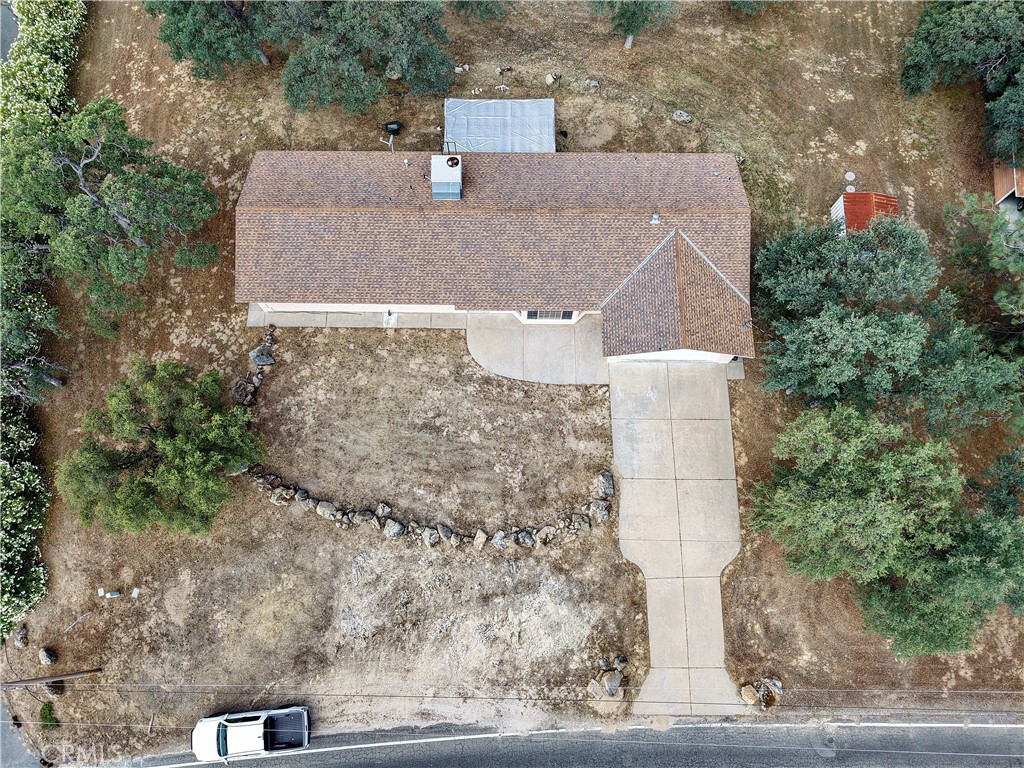 30142 Revis Road Coarsegold, CA 93614 - Photo 43 of 43 an aerial view of a house with a yard