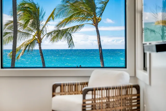 a view of swimming pool from a balcony
