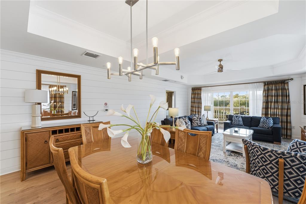 1354 Centre Ct Ridge Drive, Unit 204 Reunion, FL 34747 - Photo 12 of 46 a view of a dining room with furniture window and outside view