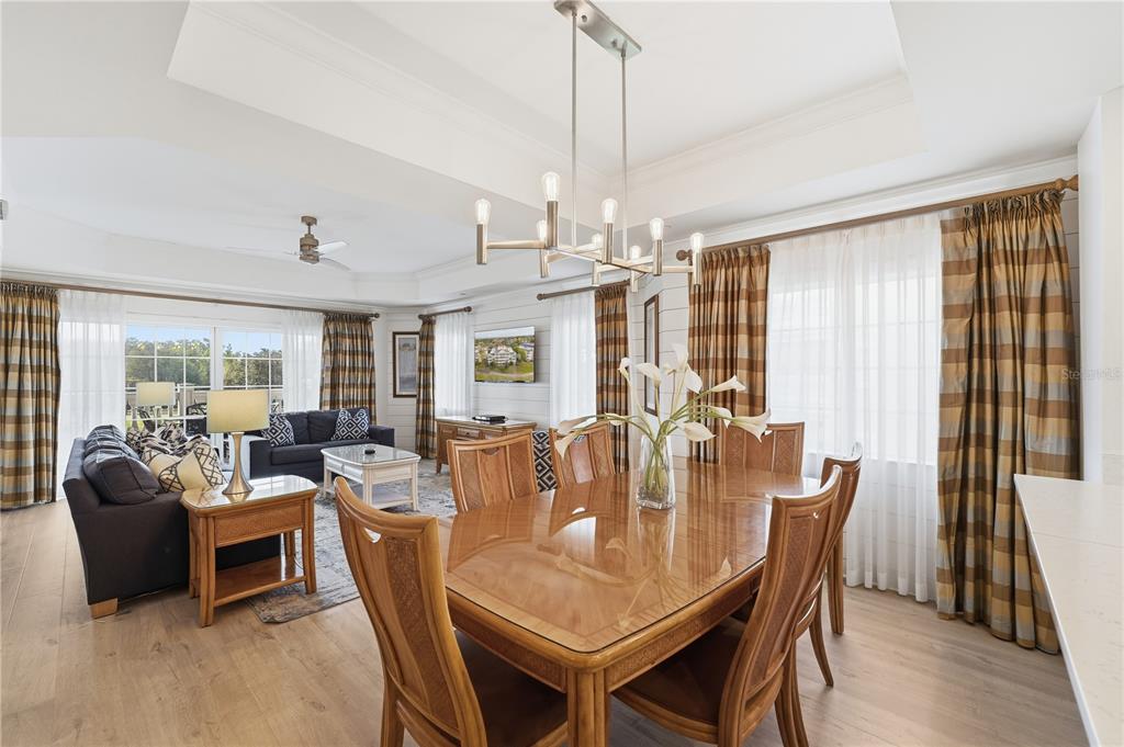 1354 Centre Ct Ridge Drive, Unit 204 Reunion, FL 34747 - Photo 13 of 46 a view of a dining room with furniture window and outside view