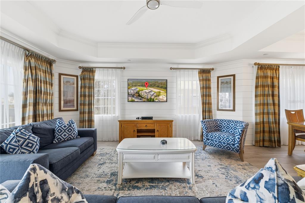 1354 Centre Ct Ridge Drive, Unit 204 Reunion, FL 34747 - Photo 15 of 46 a living room with furniture and a window