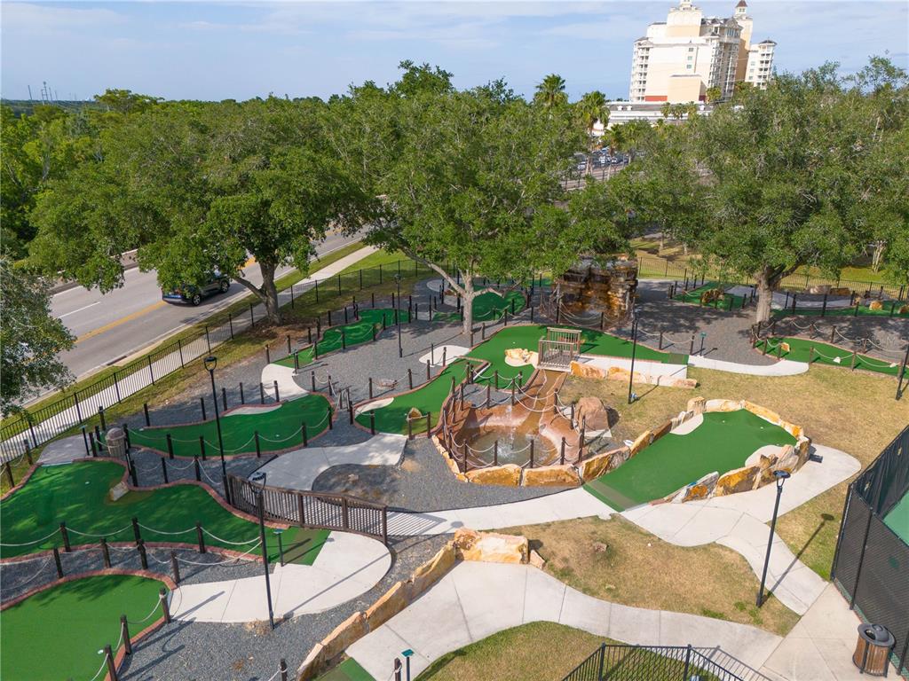 1354 Centre Ct Ridge Drive, Unit 204 Reunion, FL 34747 - Photo 43 of 46 an aerial view of a house with a yard basket ball court and outdoor seating