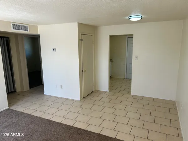 a view of walk in closet with window