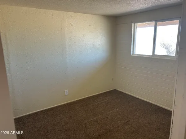 a bathroom with a toilet and a bathtub
