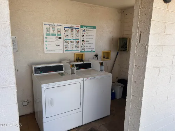 a bathroom with a mirror and a shower