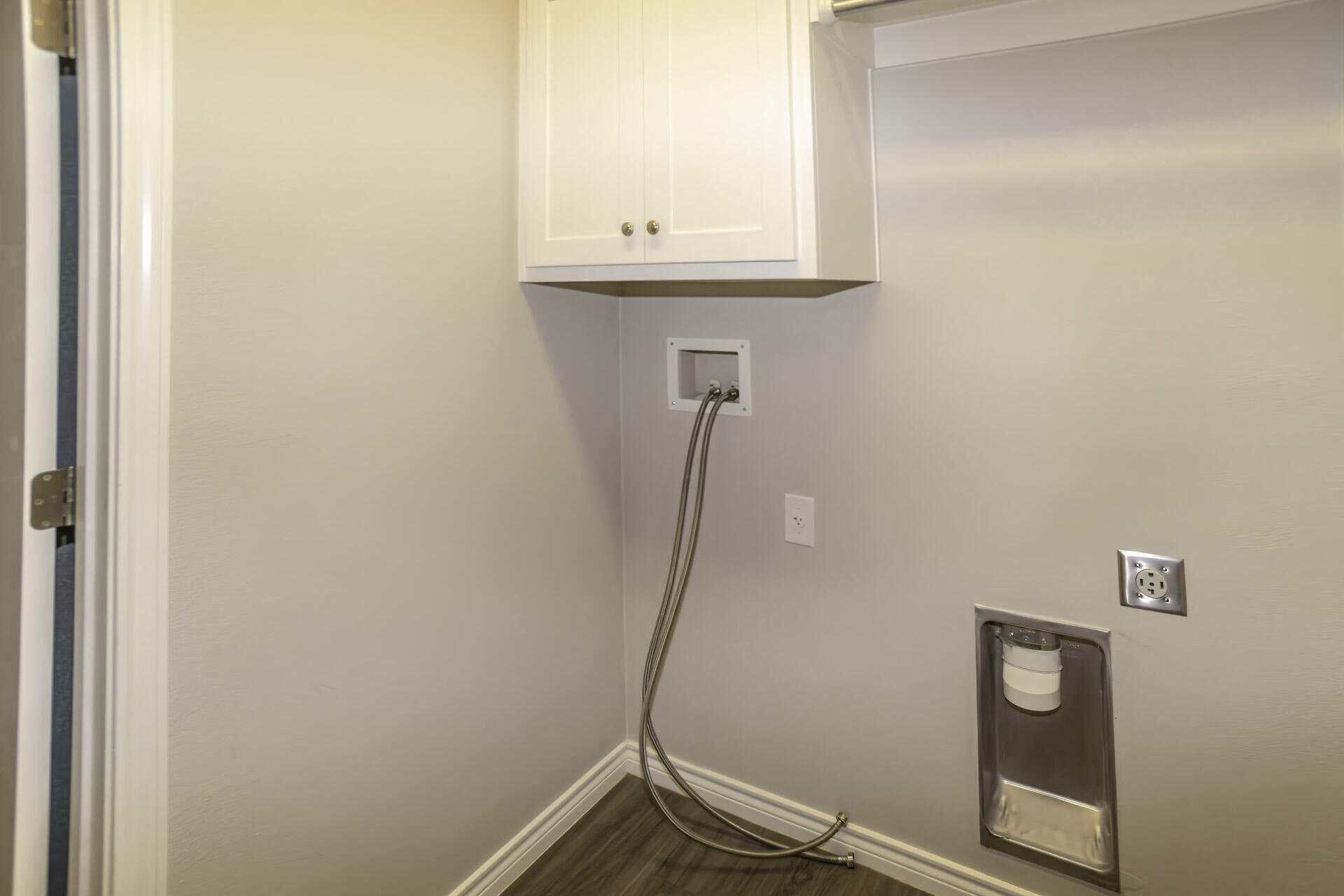7012 12th Street Lubbock, TX 79416 - Photo 15 of 15 a bathroom with a sink and mirror