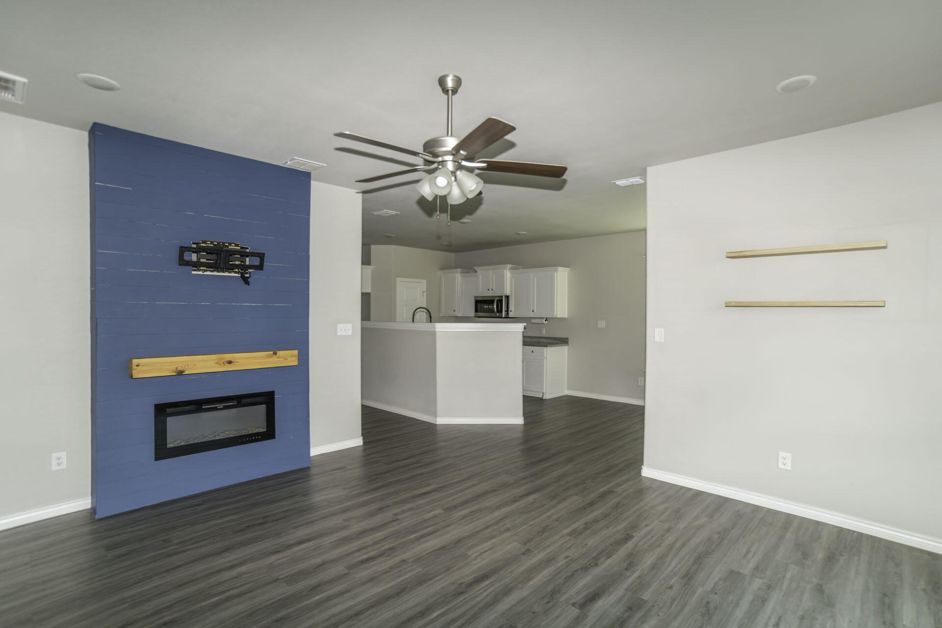 7012 12th Street Lubbock, TX 79416 - Photo 3 of 15 a view of a kitchen with a sink and a refrigerator