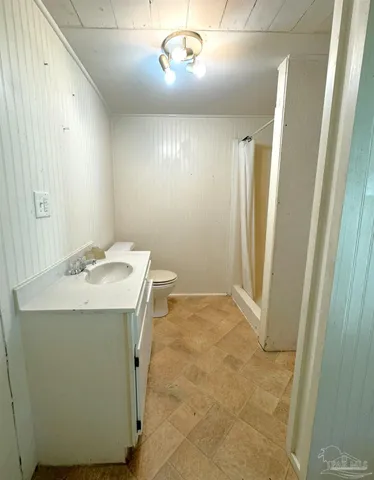a view of a hallway with washer and dryer