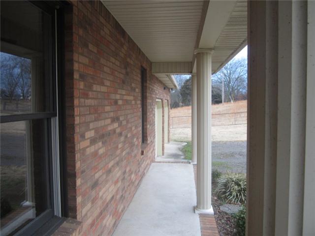172 Cave Springs Road Lebanon, TN 37087 - Photo 3 of 19 Rocking chair front porch |