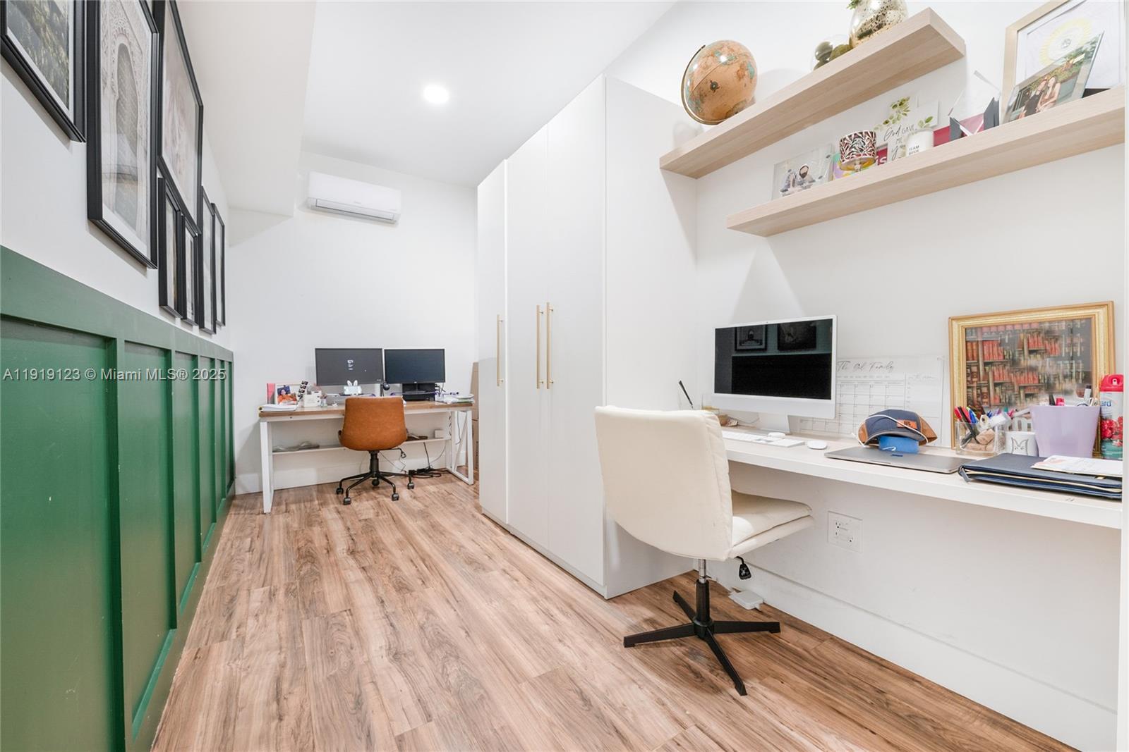 3550 West 86th Terrace, Unit 3550 Hialeah, FL 33018 - Photo 16 of 17 a living room with furniture and a flat screen tv