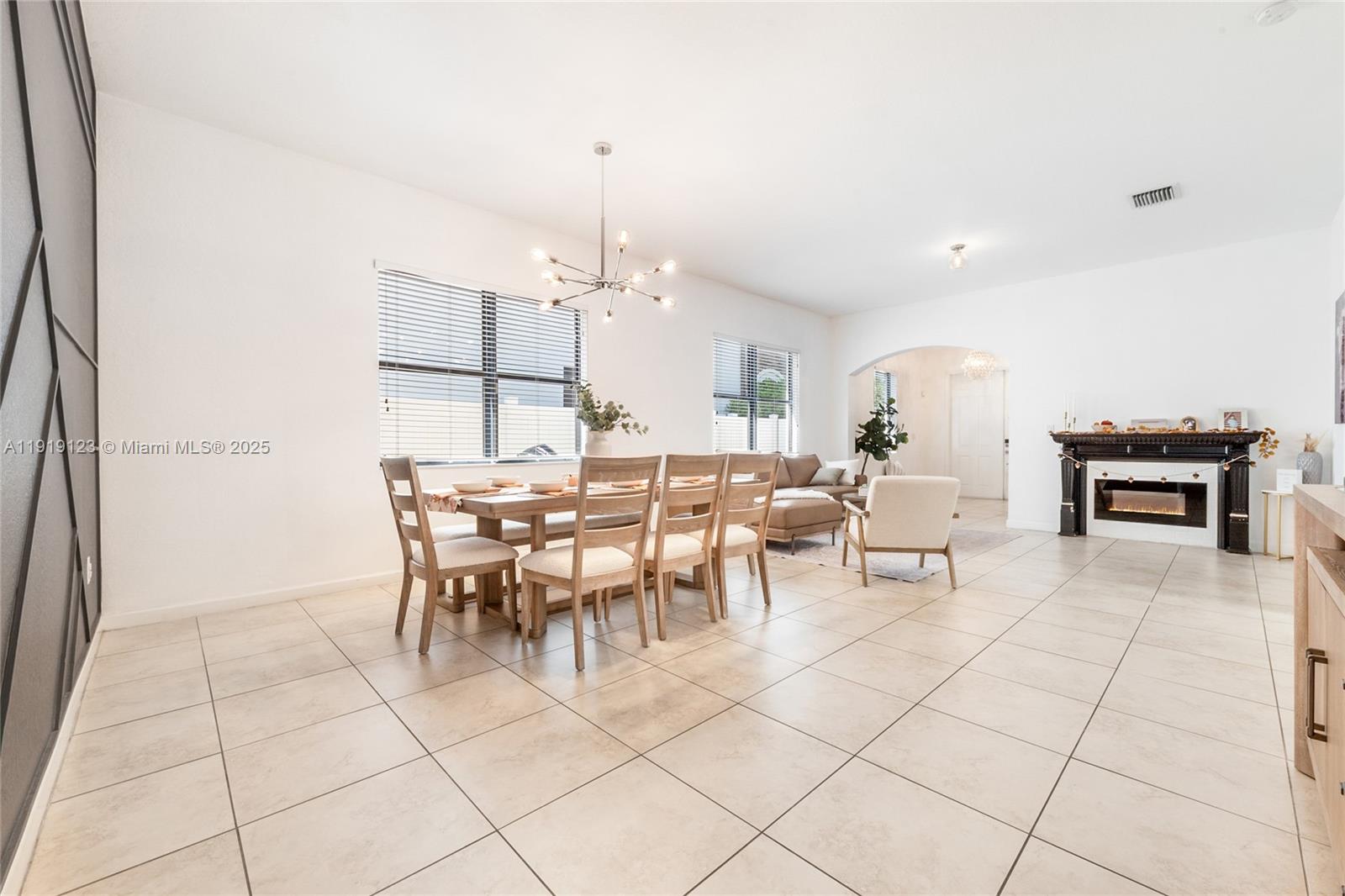 3550 West 86th Terrace, Unit 3550 Hialeah, FL 33018 - Photo 6 of 17 a view of a dining room with furniture