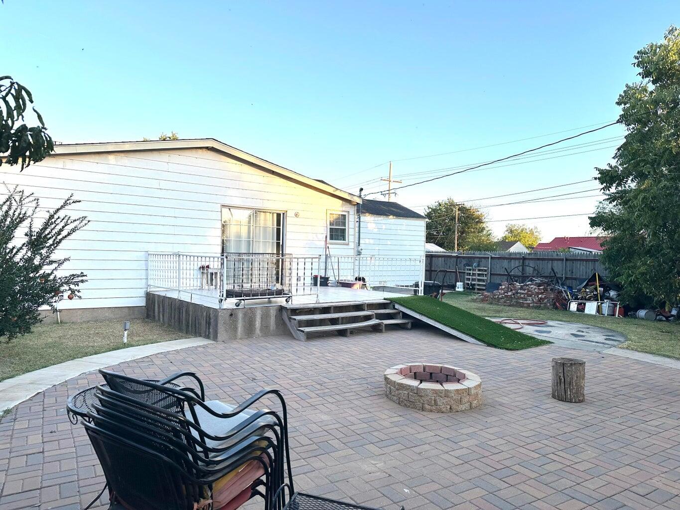 401 Xenia Street Plainview, TX 79072 - Photo 17 of 20 a view of swimming pool with outdoor seating and plants