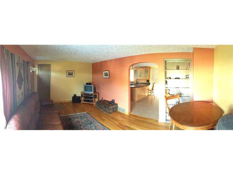 228 Orchard Spring Road Pittsburgh, PA 15220 - Photo 2 of 21 Living Room. THE LIVING ROOM HAS A REFINISHED HARDWOOD FLOOR.