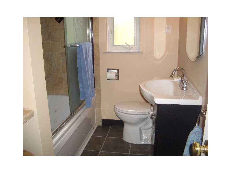 228 Orchard Spring Road Pittsburgh, PA 15220 - Photo 9 of 21 Full Bath. THE FLOOR IS NEWLY TILED AND INCLUDES A THERMOSTATICALLY CONTROLLED HEATED FLOOR SYSTEM.ALL FIXTURES,FITTINGS SINK AND COMMODE ARE NEW,WALLS,AND CEILINGS ARE ALL REFINISHED.